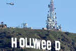 Holy smoke! Iconic sign altered to 'Hollyweed' in New Year