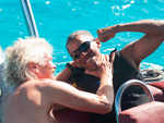 Now, common man Obama kiteboards with billionaire Richard Branson