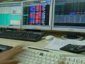 Sensex, Nifty pare most gains, end at record high