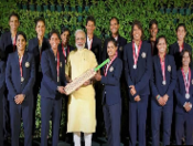 Indian Women's cricket team gifts signed bat to PM