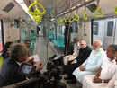 PM Modi flags off Kochi's first Metro train, takes ride with E Sreedharan