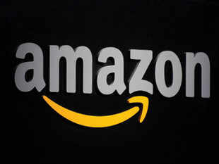 Flipkart investor Tiger Global  reduces its stake in Amazon by 67% - Economic Times