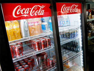 At some  Coca-Cola exclusive stores, a can of coke worth Rs 30 costs Rs 100 - Economic Times