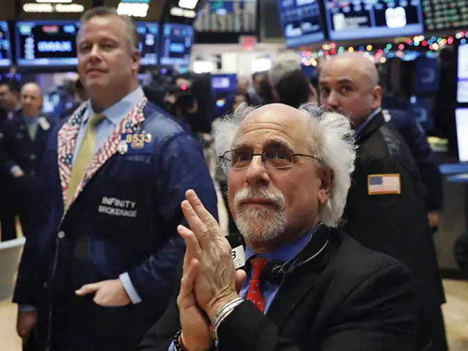 Dow Jones tops 20,000 mark for the first time