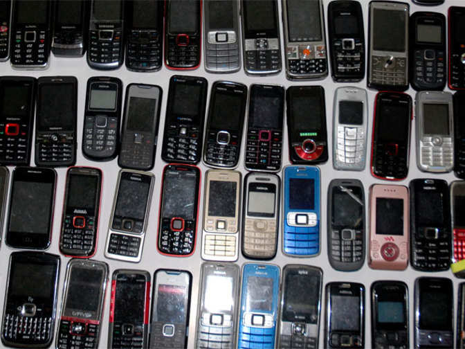 With over 100 handset brands  in a $15 billion market, consolidation is just around the corner - Economic Times