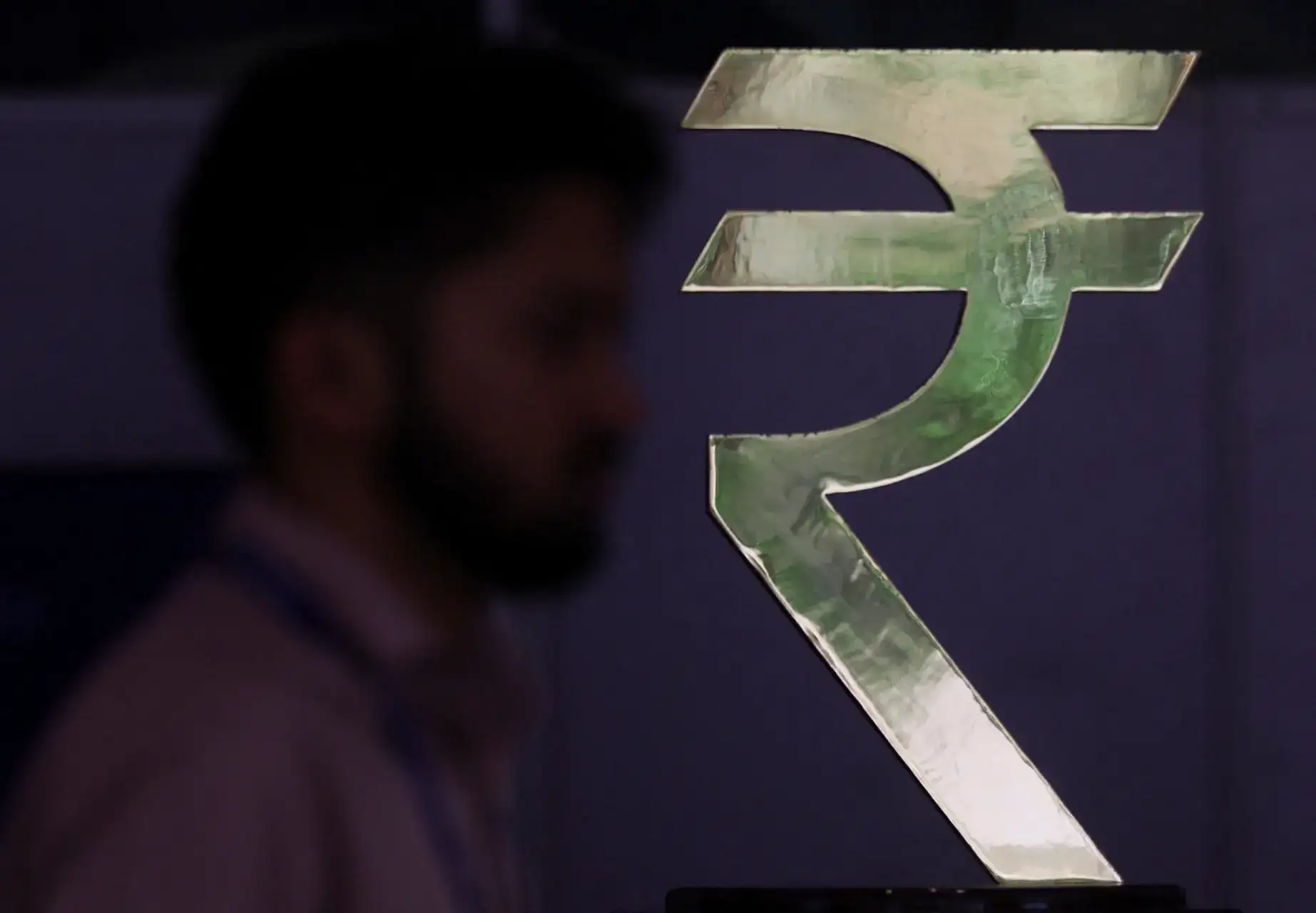 RBI mulls all options, including rate hike, as rupee slumps