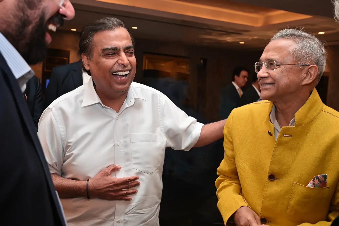 Samir Jain greeting Mukesh Ambani 