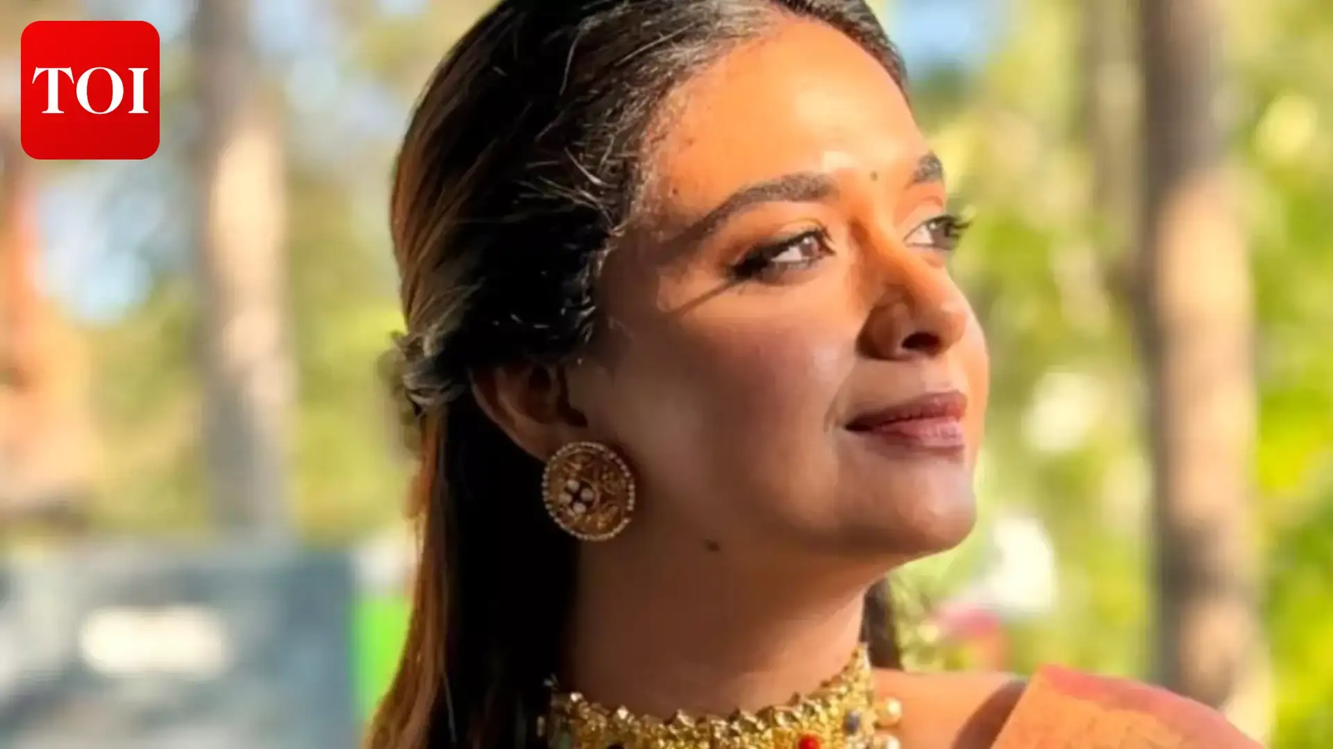 Keerthy Suresh's colorful wraparound balcony with plants and backwater views in her Kochi home