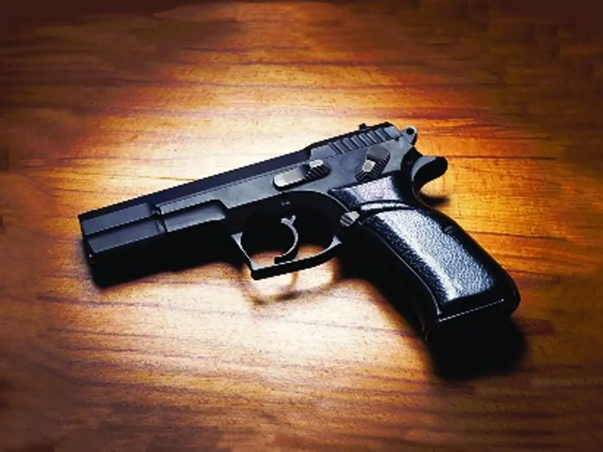 leader shot dead outside party