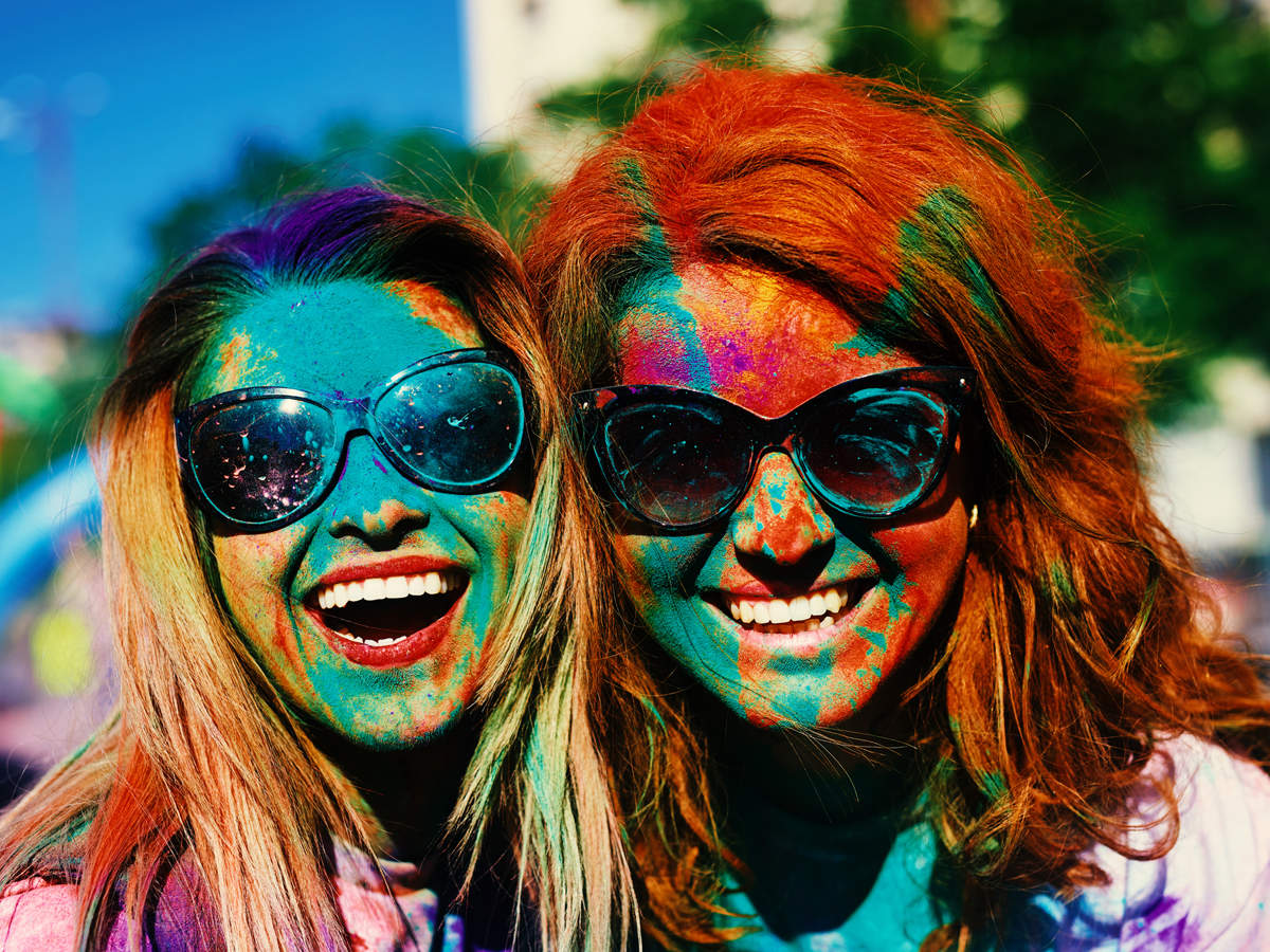 Holi color powder on sunglasses. Organic Gulal colours on eyeglasses for  Holi festival, Hindu tradition festive Stock Photo by ©gilmanshin 250451884