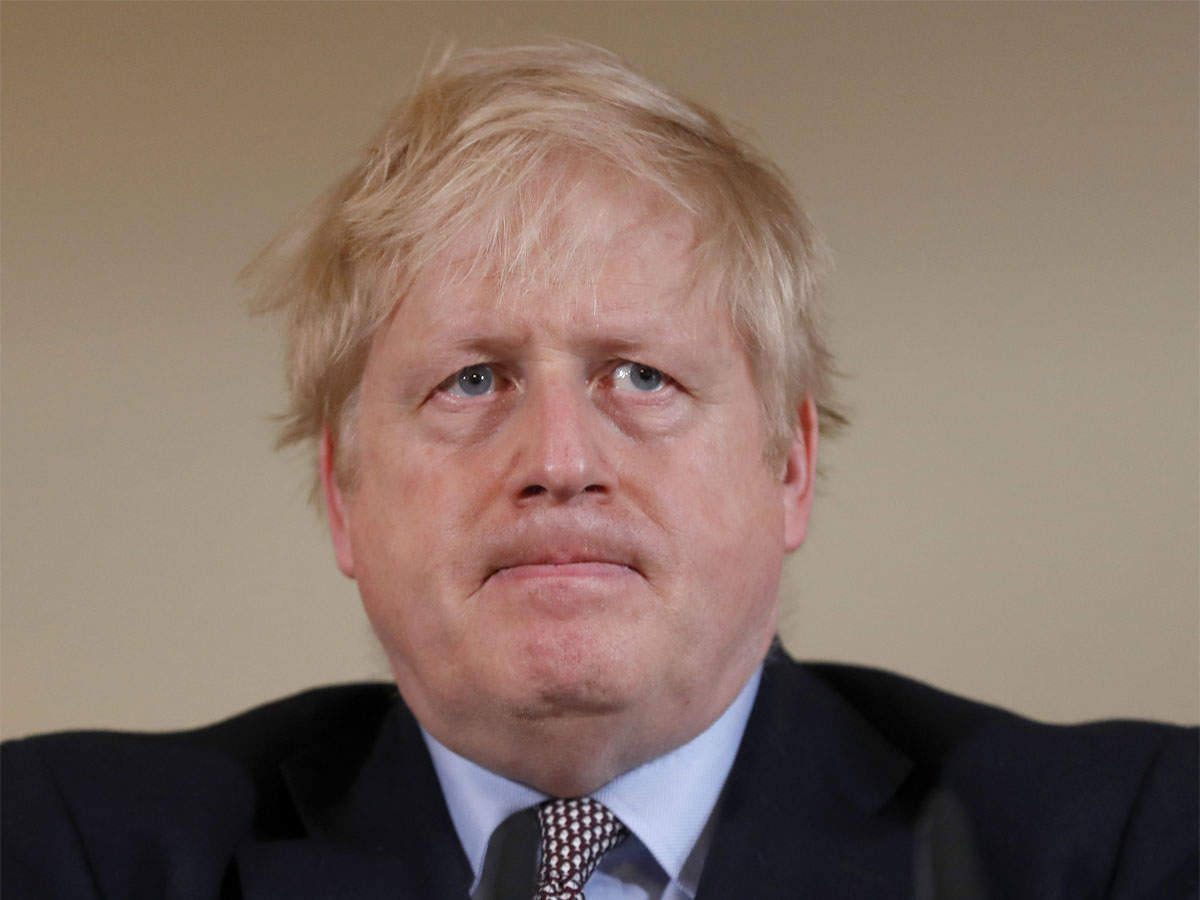 Back at work, British PM Boris Johnson faces lockdown Catch-22