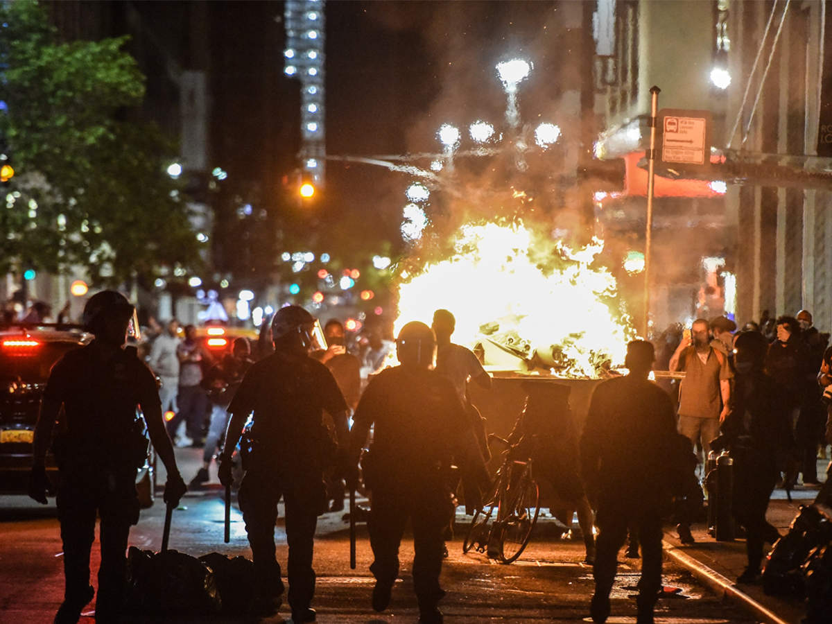 Day of peaceful New York City marches gives way to chaos after dark