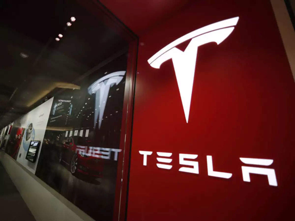 Tesla’s quarterly profit tops $1 billion for first time