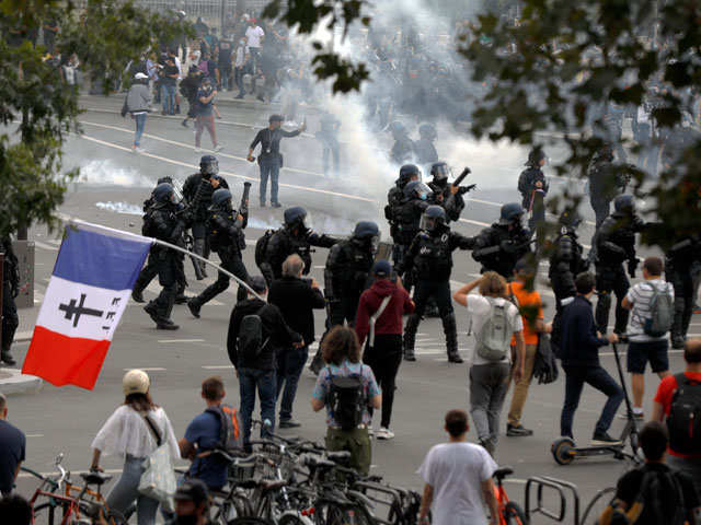 Paris: French police clash with protesters opposed to COVID health pass, use tear gas and water cannons