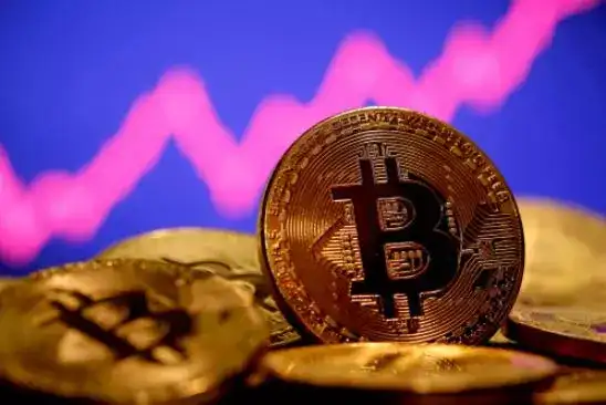 Bitcoin briefly tops $50,000 level for first time since mid-May