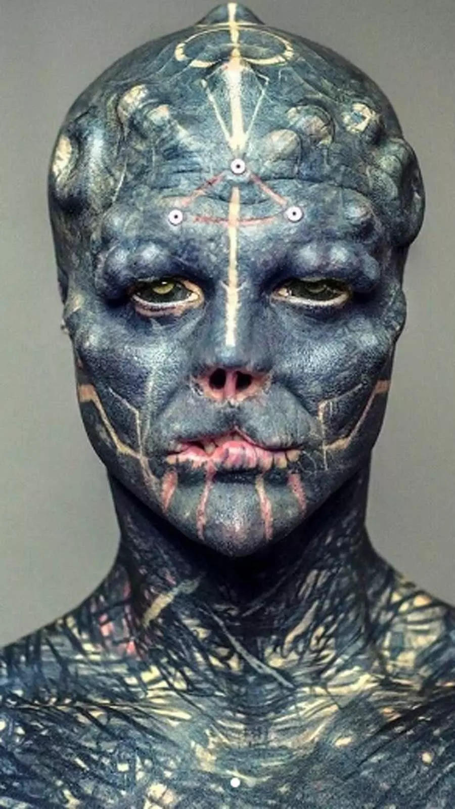 Extreme tattoos & body modifications could get you in serious trouble. Ask this guy