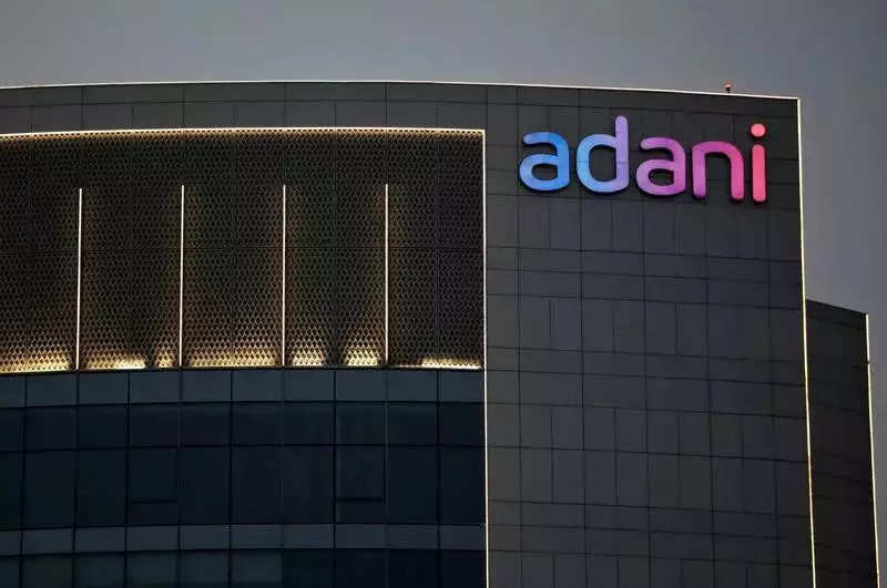 Adani shares slip, Group m-cap falls by Rs 49,400 cr