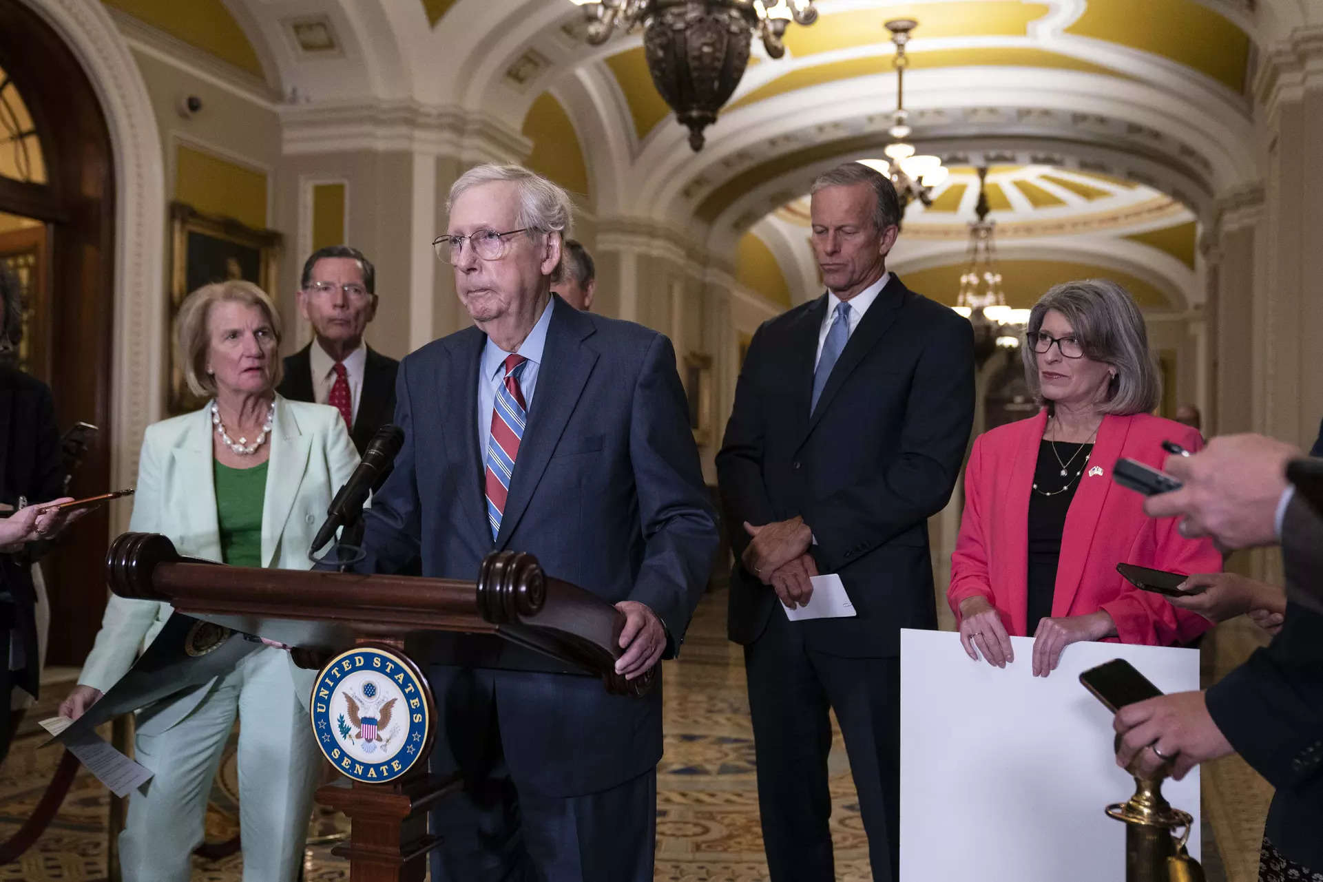 Mitch McConnell freezes at press conference and is escorted away