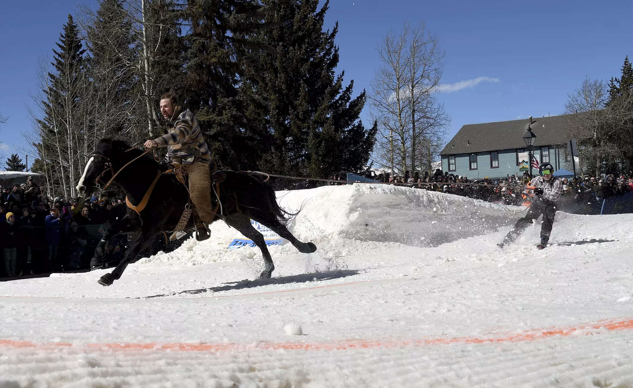 Is it skiing? Is it horse riding? No, it’s skijoring 