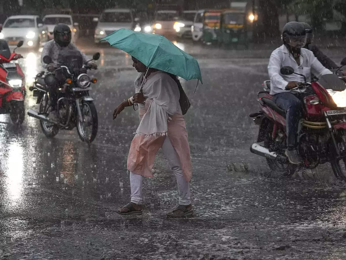 In Pics: Rain relief in Bengaluru after 5 months, but traffic woes continue 