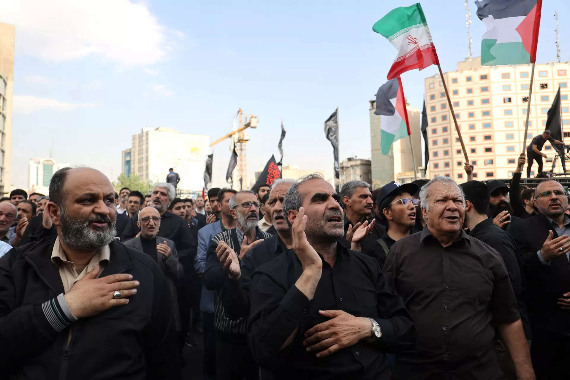 In divided Iran, president's death met by muted mourning and furtive celebration 
