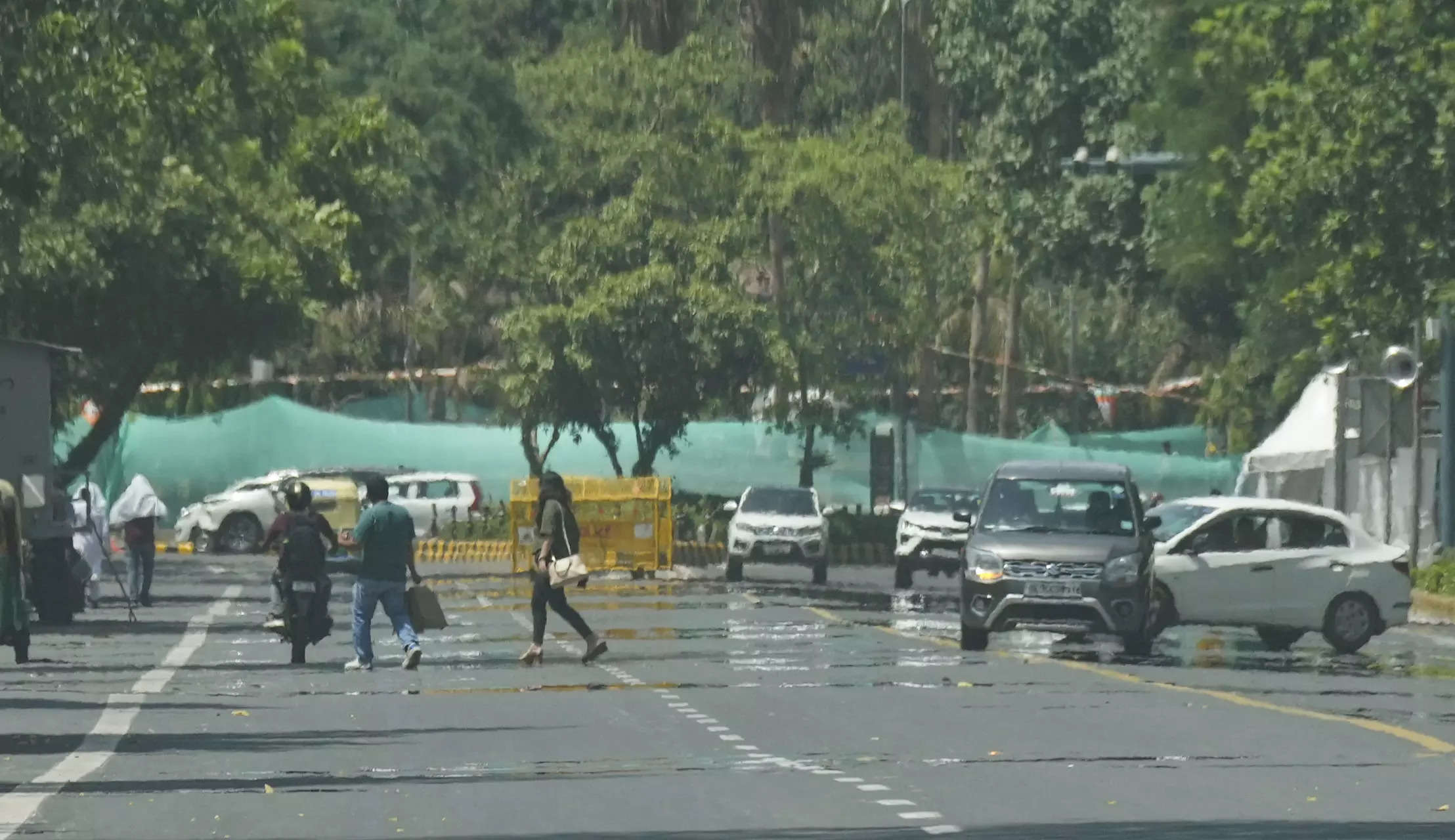 Delhi sees relief from sweltering heat as rain brings temporary respite; IMD warns of heatwave return next week 