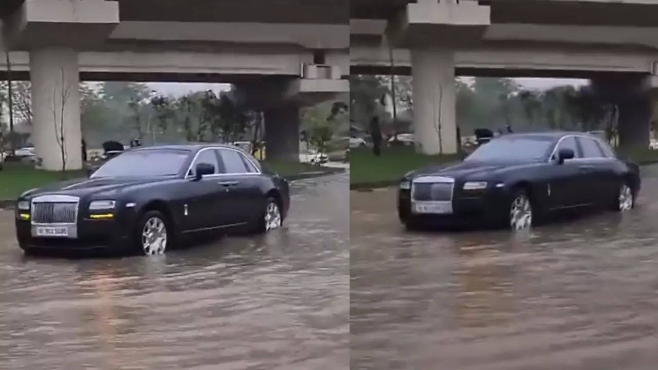 Watch: Rolls-Royce Ghost washed away in waterlogged road in Delhi, Internet users suggest use 'Aulto' 