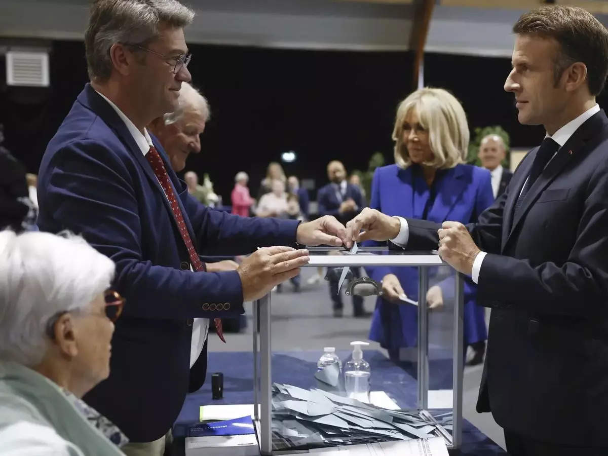 France election: Voter turnout high, could force Emmanuel Macron to share power with far right 