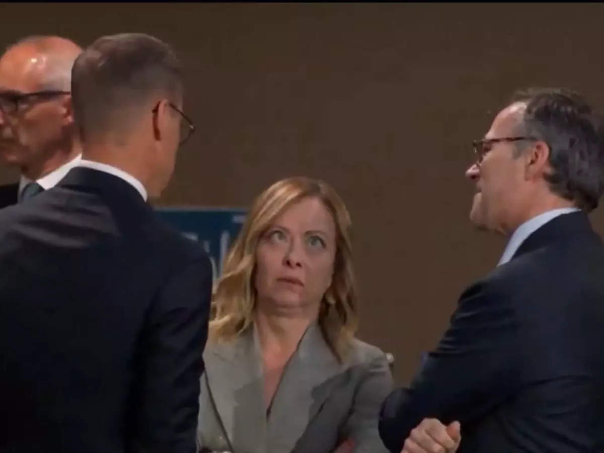 Giorgia Meloni's viral video: Italian PM caught eye-rolling and smirking as Biden gets late for NATO Summit. Watch video here 