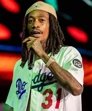 Why was Wiz Khalifa arrested in Romania during the performance at Beach Please! Festival? 