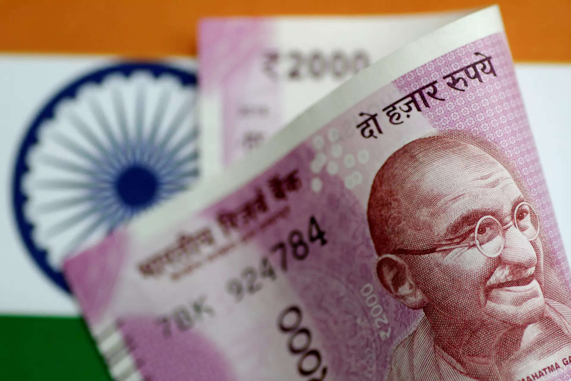 India rupee ends just shy of record low on companies' dollar bids 