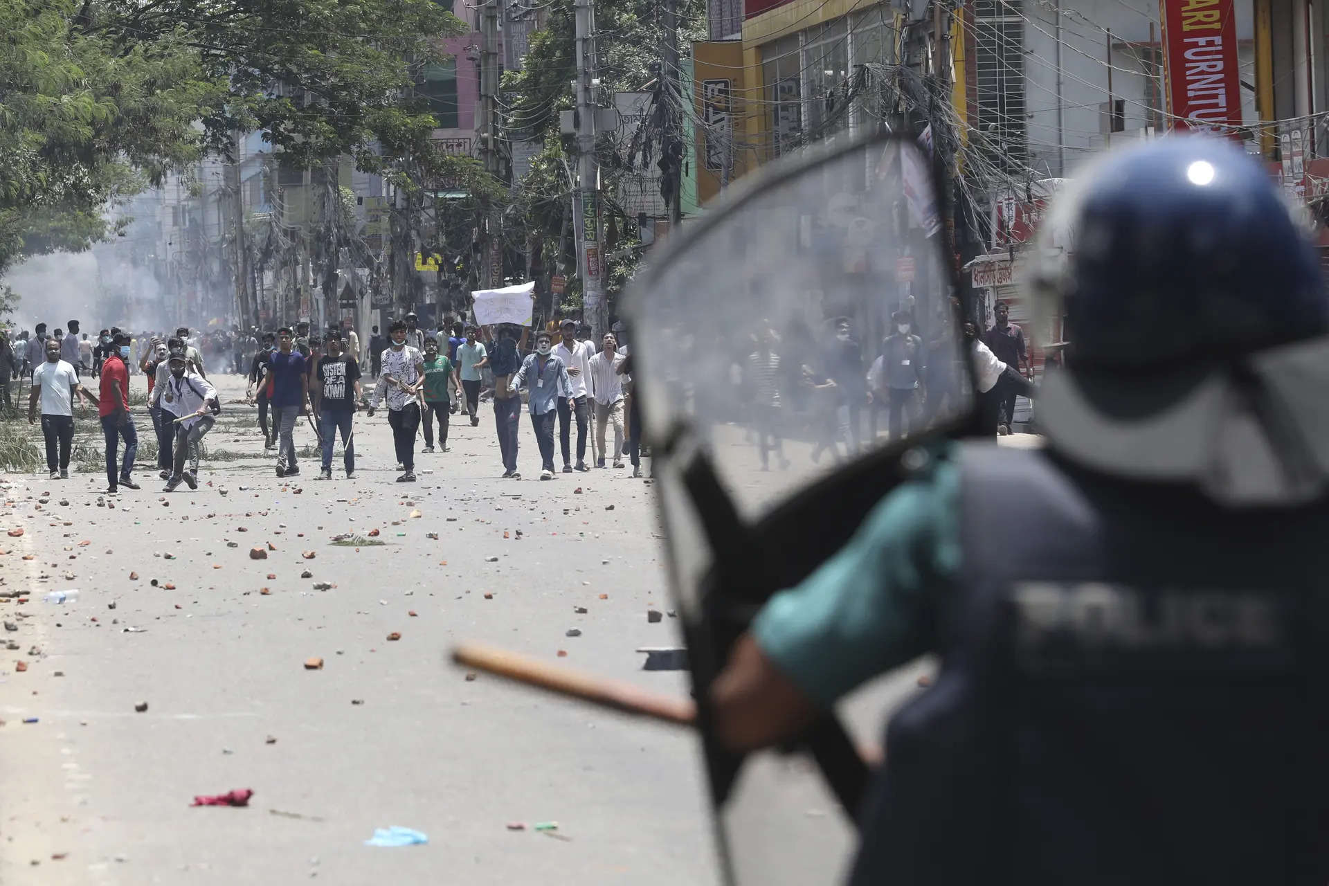 Bangladesh enforces a curfew after days of deadly student protests over government jobs quota 