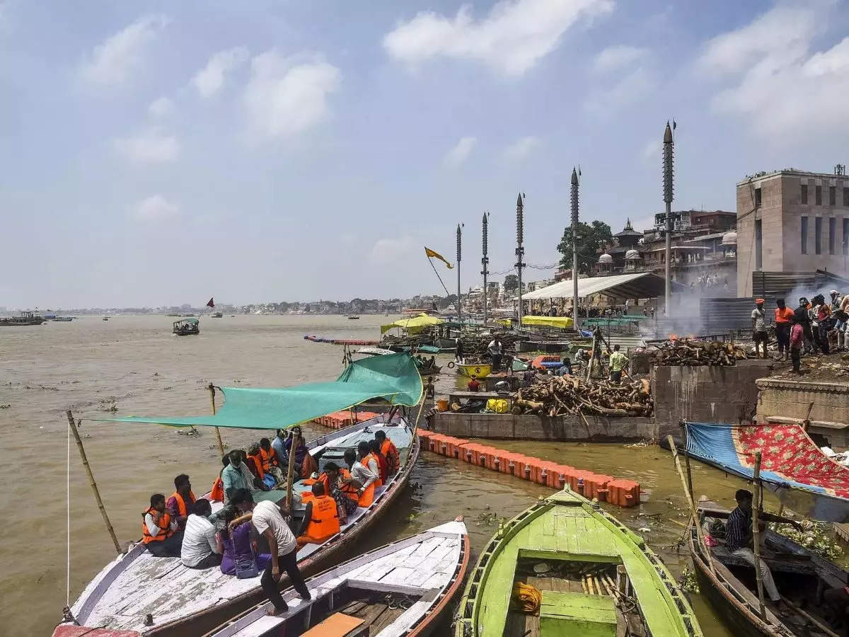 Cremation, Ganga aarti spots shifted in Varanasi as swollen Ganga river inundates lower steps 