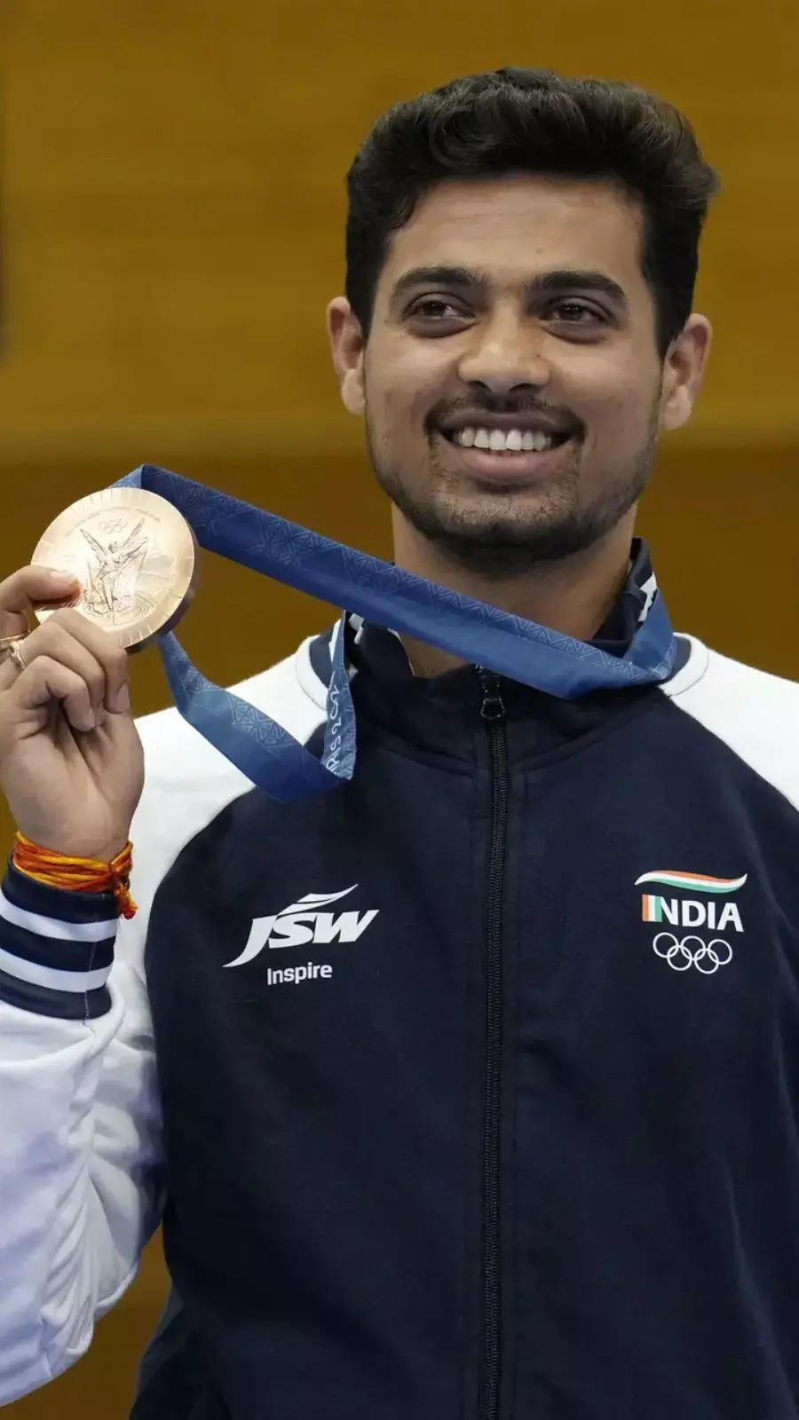 Swapnil Kusale: Village teacher's son, railway ticket collector, now an Olympic medalist 