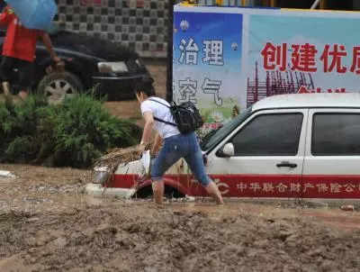 At least 30 dead, 35 missing after torrential rains: China state media 