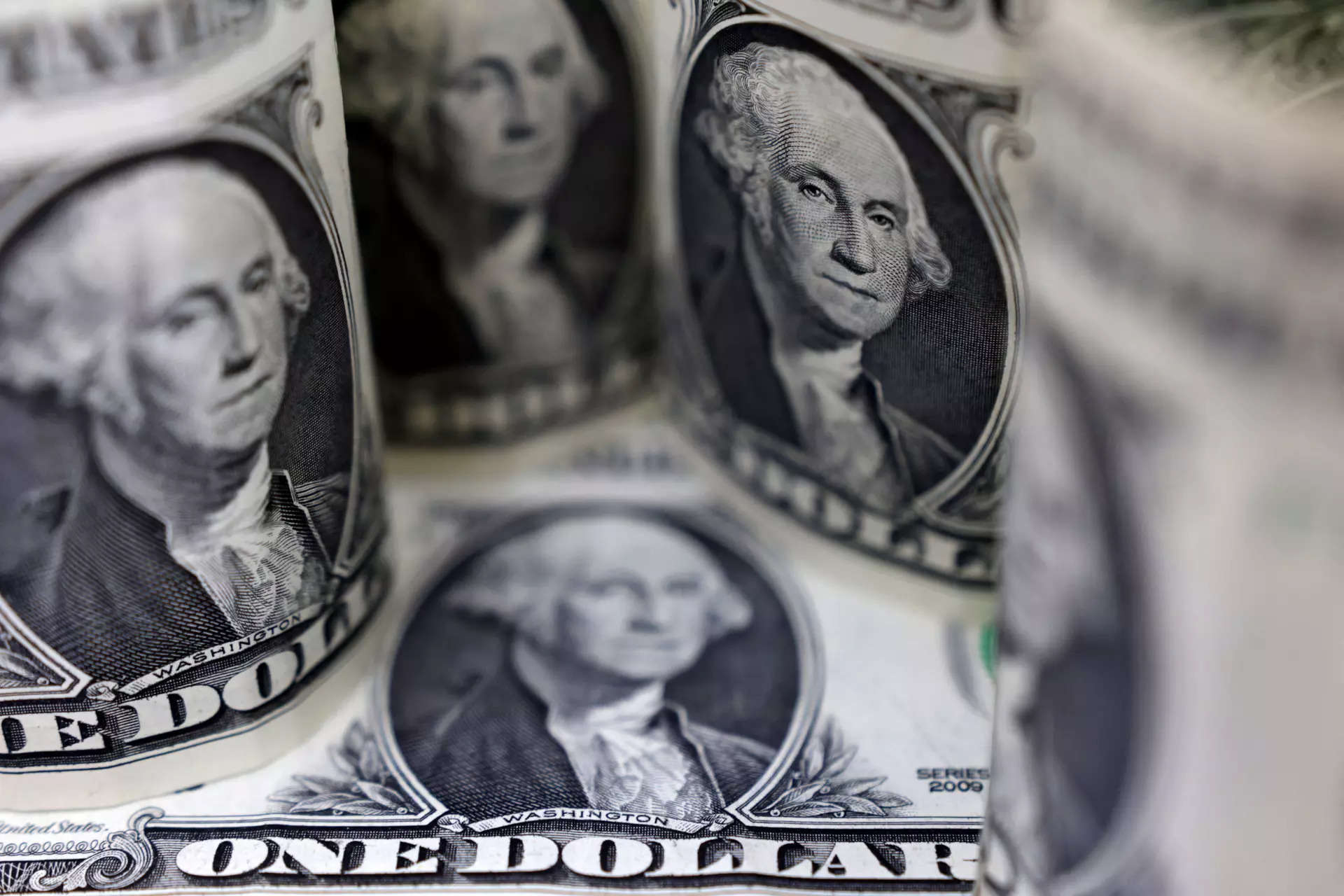 Dollar gains on geopolitical tensions, pound slips after rate cut 
