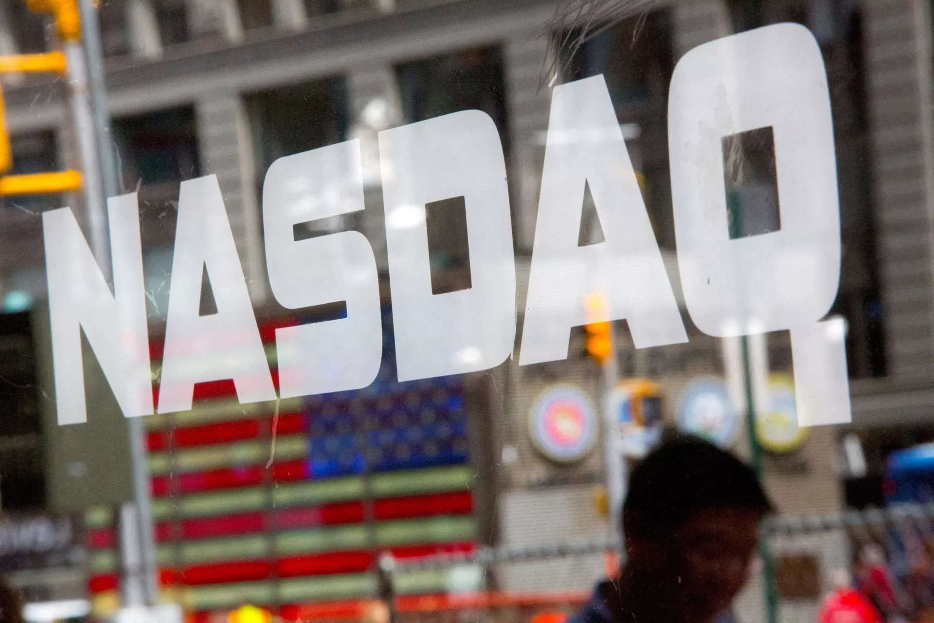 Nasdaq ends down 1% as tech shares fall; Treasury auction weak 