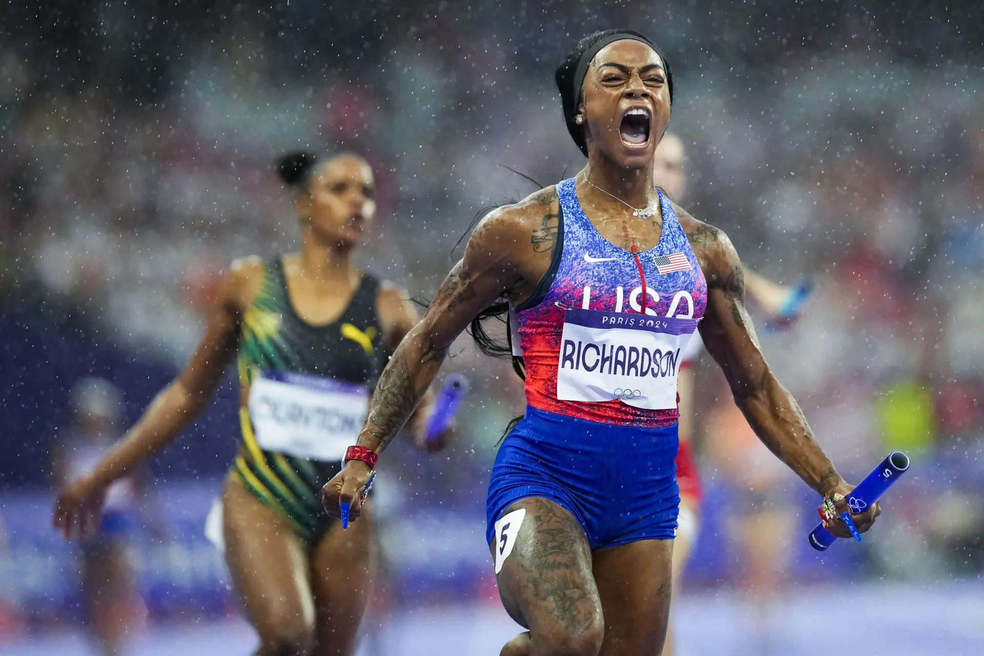 Sha'Carri Richardson chases down 2 competitors in rain to end her first Olympics with a relay gold 