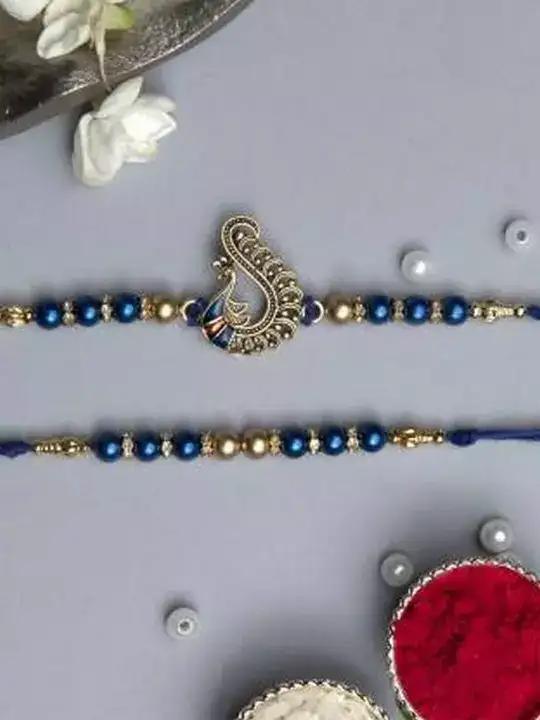 Image for eCraftIndia-Setof2OmSymbolandPearlDesignerRakhiGiftSet