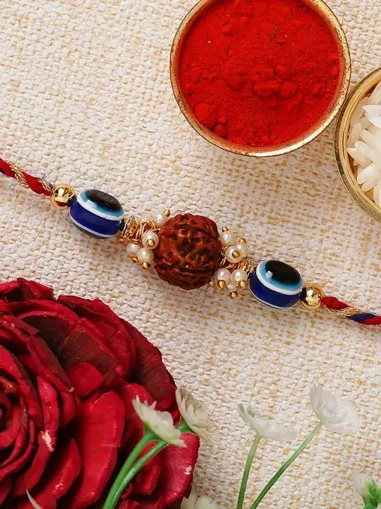 Image for eCraftIndia-MulticolouredEvilEyeRudrakshRakhiandRoliChawal