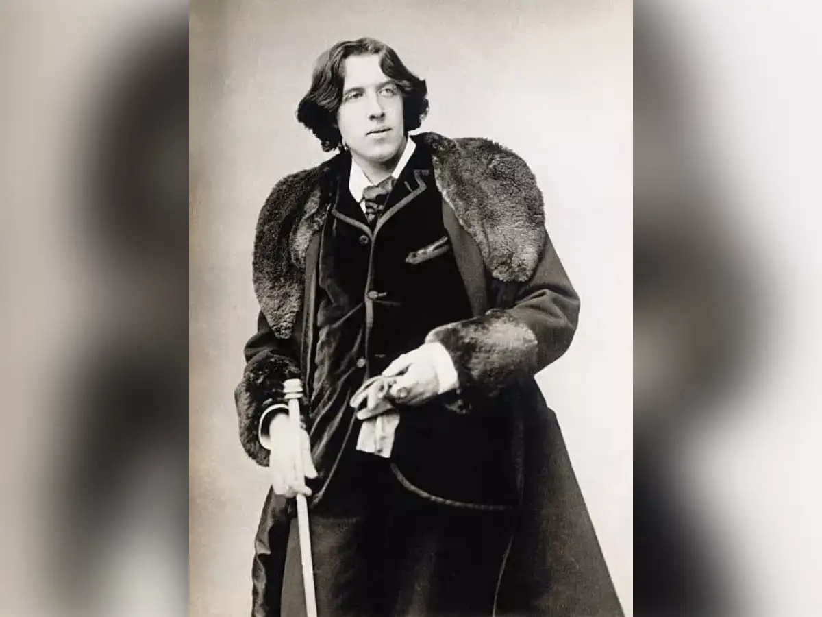 Quote of the Day by Oscar Wilde: “To live is the rarest thing in the world. Most people exist, that is all.” — a simple and powerful message about truly living life, enjoying every moment, and not just following routine