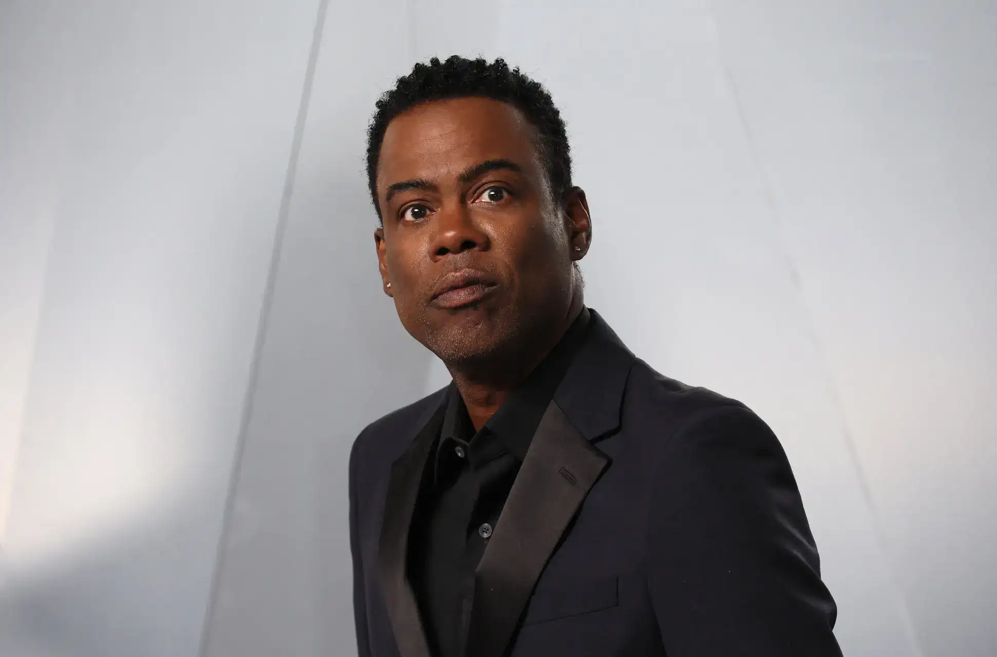 A decade after divorce, Chris Rock's romance heats up with a younger DJ - here's who he's dating