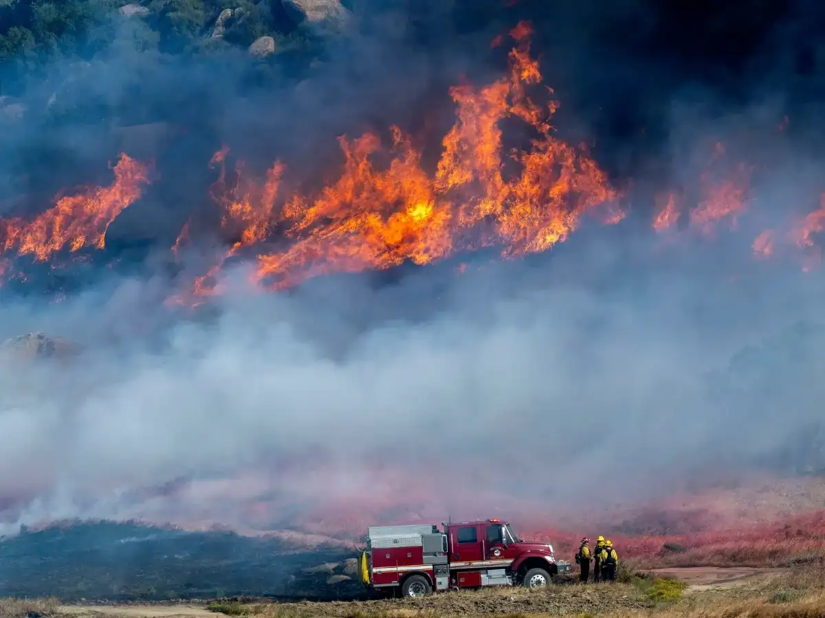 A fast-growing wildfire in windy Southern California triggers evacuations