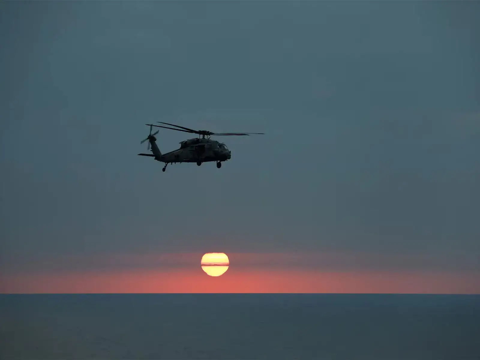 US, Iran race to find missing crew member from downed military plane