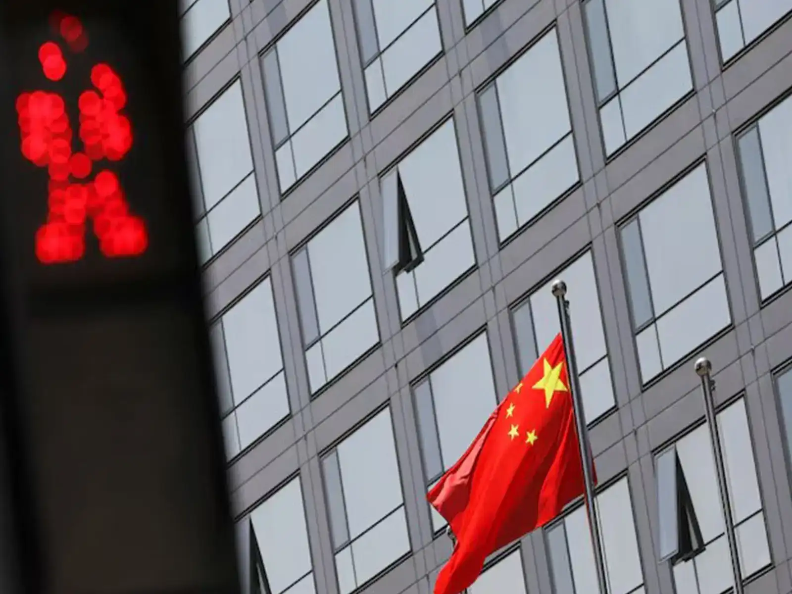 China tells travellers to use caution after 'malicious' US border checks