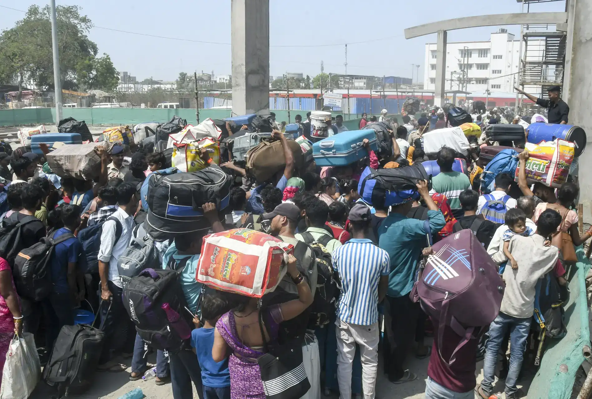 Chaos breaks out at Surat's Udhna Railway Station as passengers complain of long queues, scorching heat & lack of facilities