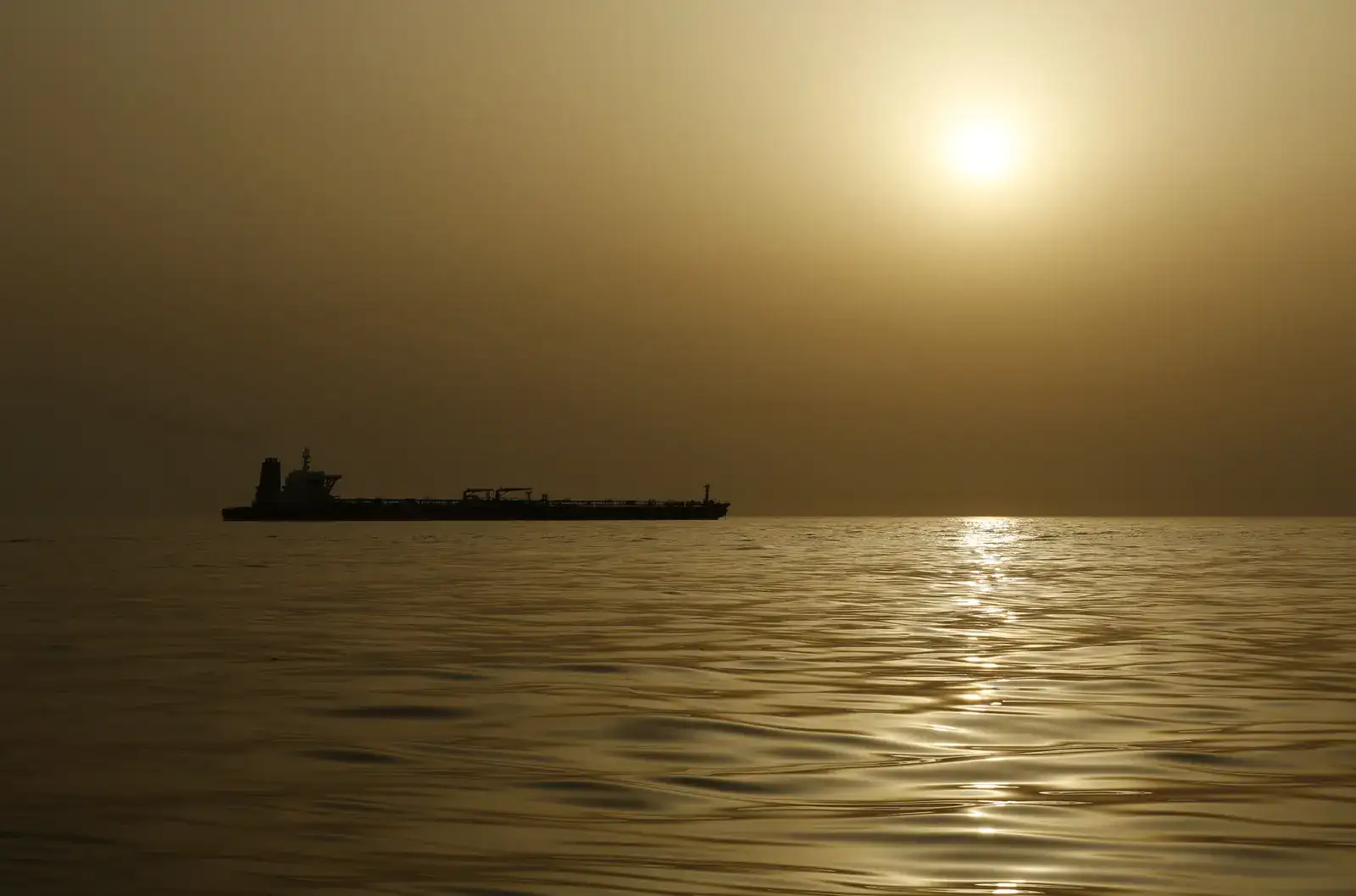 Iran tankers laden with crude go dark to sail past US blockade