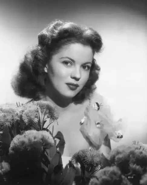 Thought of the day by Shirley Temple: ‘Intentions often melt in the face of unexpected…’ quote on how to embrace life when opportunity knocks