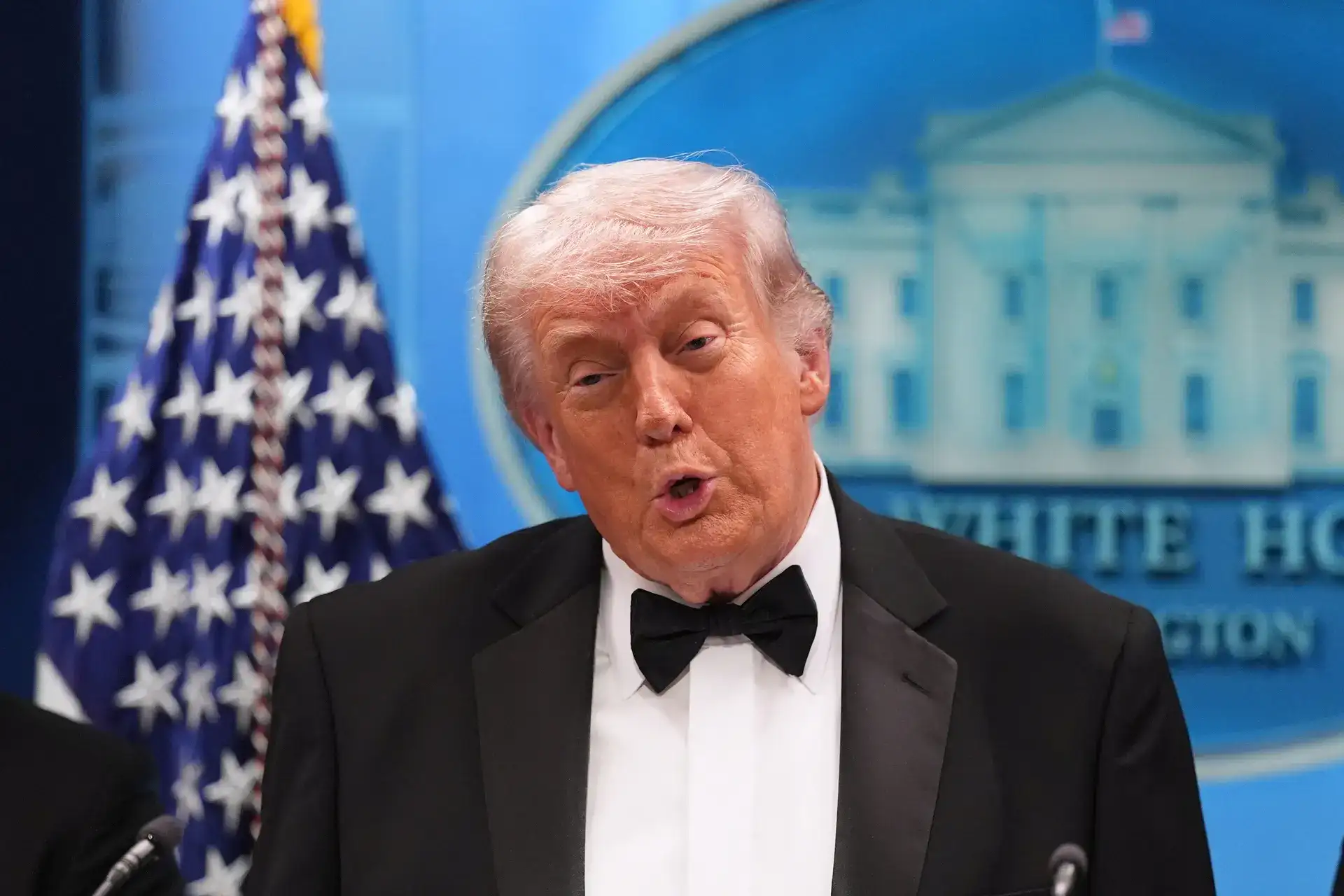 Trump shares first image of White House shooting suspect, shows man pinned down by armed officers