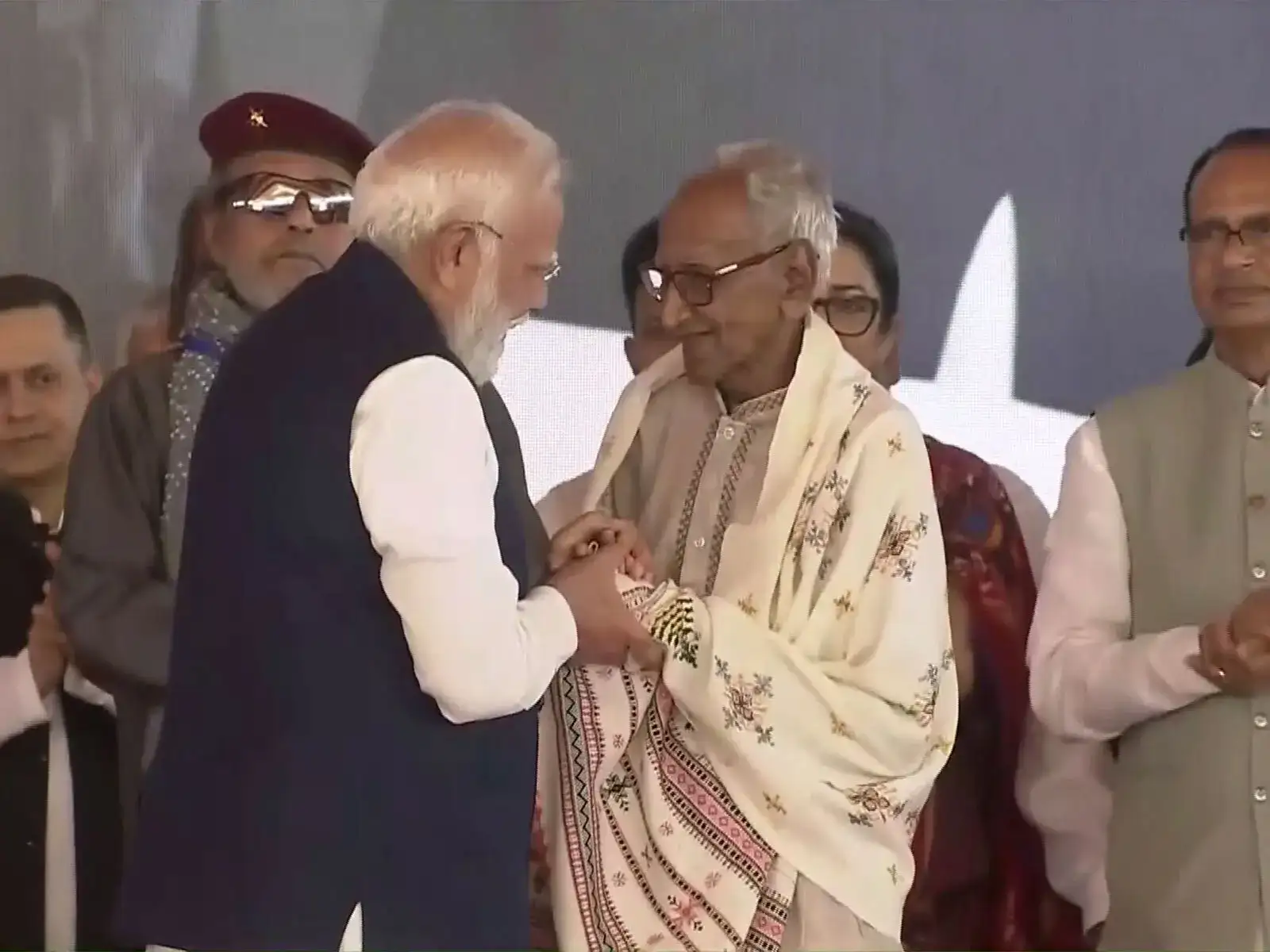 PM Modi felicitates BJP veteran worker Makhanlal Sarkar during swearing-in ceremony in West Bengal